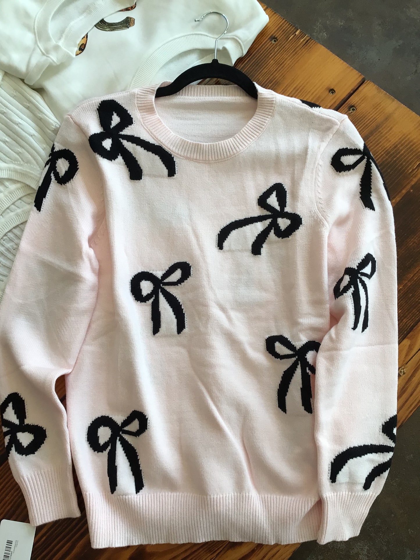 Pink Sweater with Black Bows