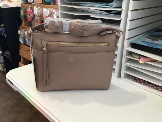 Tan purse with gold zipper