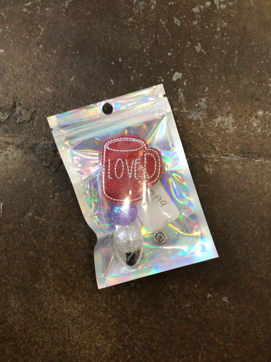Coffee badge reel