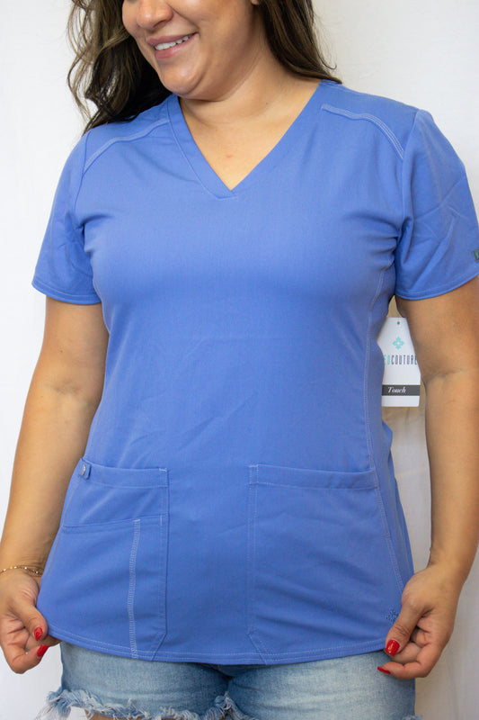 Med Couture Touch V-Neck Scrub Top for Women with 4 Pockets, Rib-Knit Side Panel, and Shirttail Hem MC7459